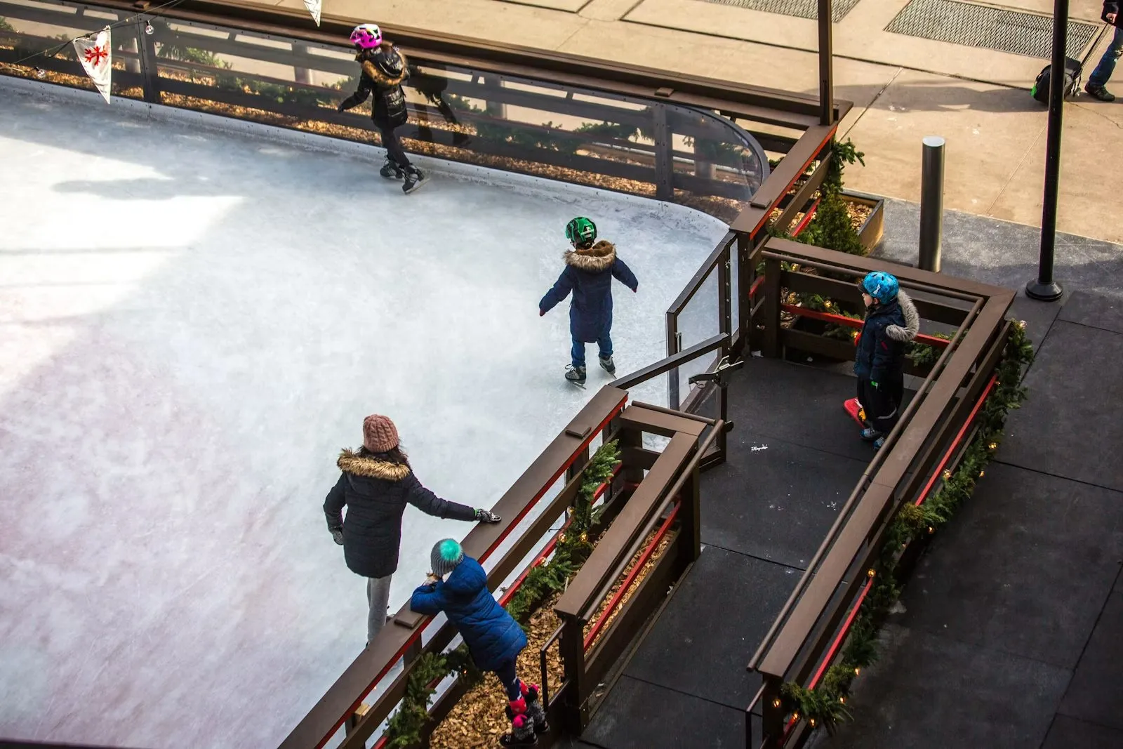 Children skating on an outdoor rink