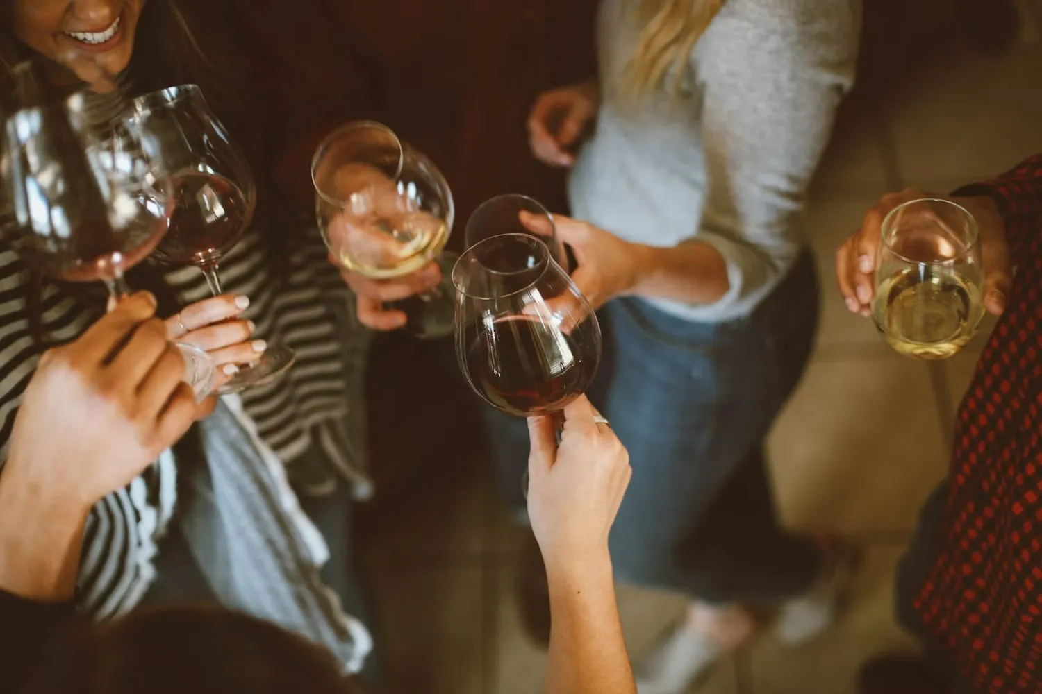 Friends toasting at a New Year&rsquo;s Eve party